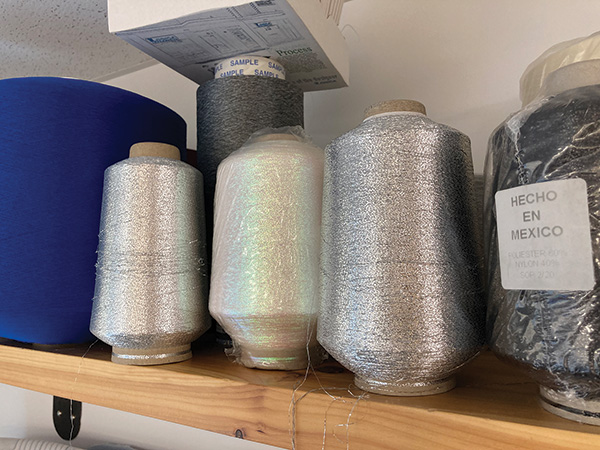 Some of Creative’s borders use high luster thread to catch shoppers’ attention from across the showroom.