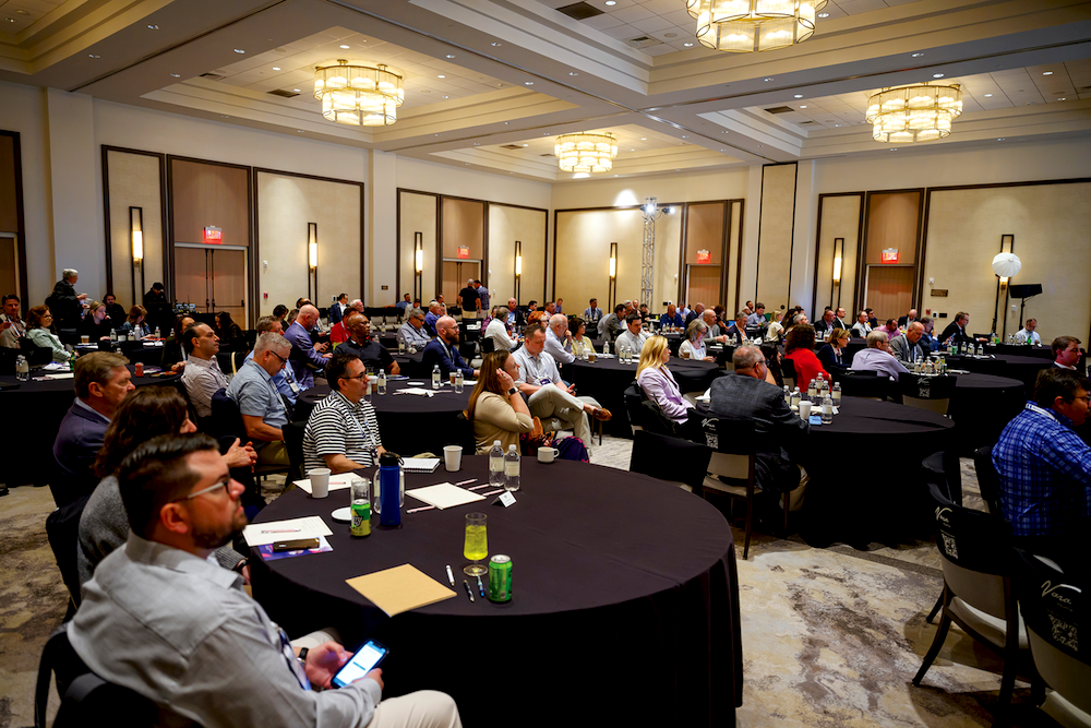 Key Insights. Attendees listened attentively to the speakers.