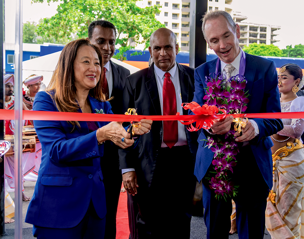 Julie Chung (far left), U.S. ambassador to Sri Lanka, and Lou Paige (far right), Englander president and CEO, were joined by local dignitaries for the ribbon cutting.
