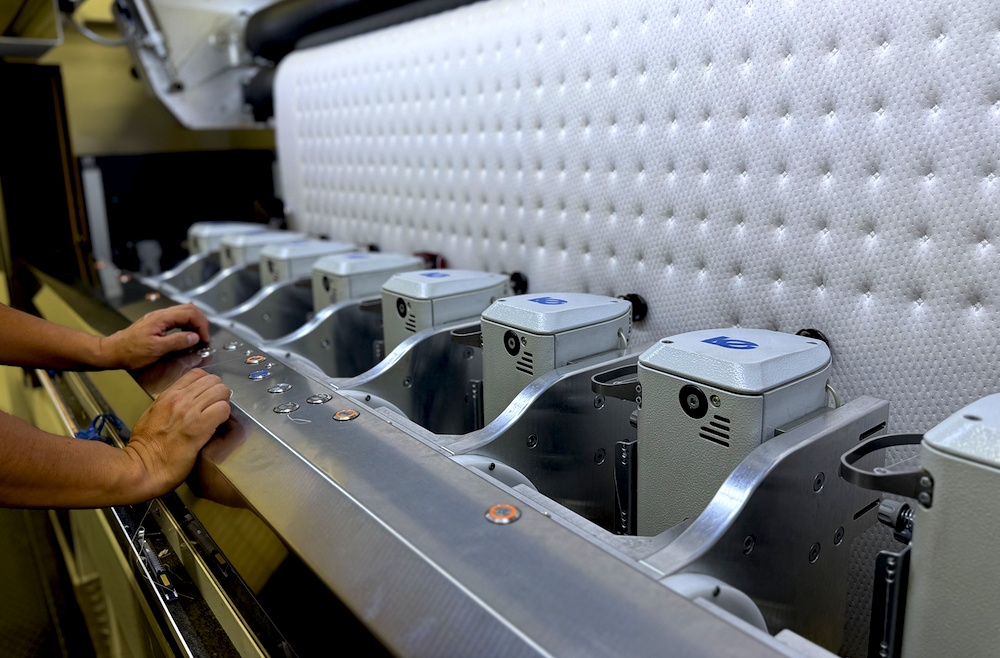 with materials and equipment representing the other half. 