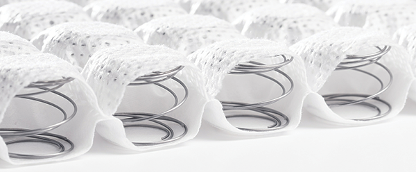 Glueless microcoils, like these offered by Spinks and Hickory Springs Manufacturing, have two environmental benefits: They are easier to recycle at end of life and can replace petrochemical-based foams in mattress constructions.