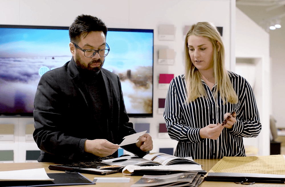 David Velarde, creative director (left), and McCall Moore,
product designer, talk in the design center of their Las Vegas showroom.